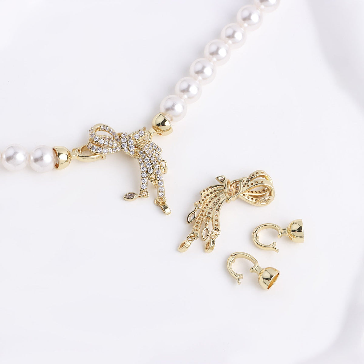 CZ Tassel Bow Clasp – 18K Gold Plated